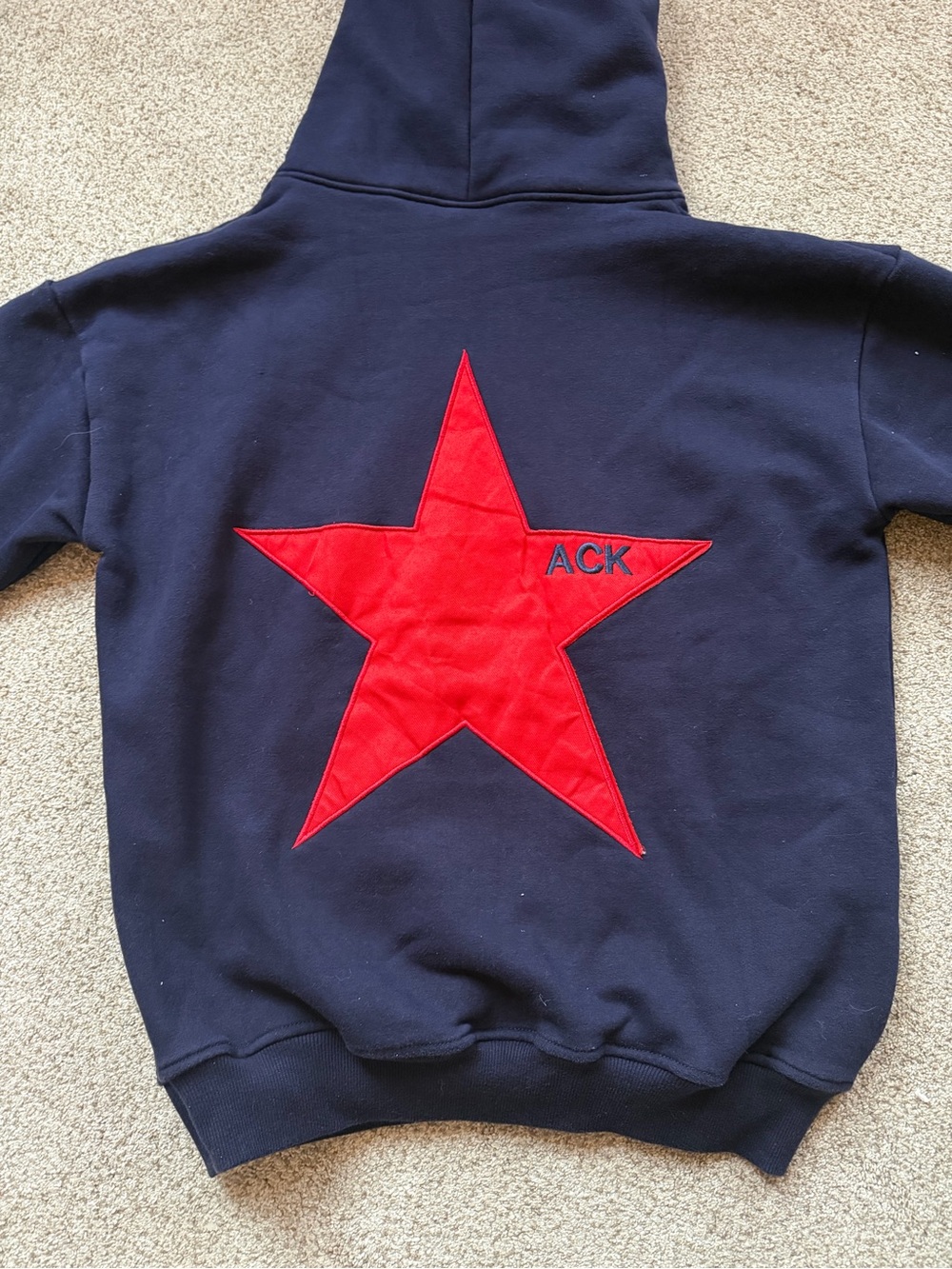 Navy Hoodie with Red Star Accent -